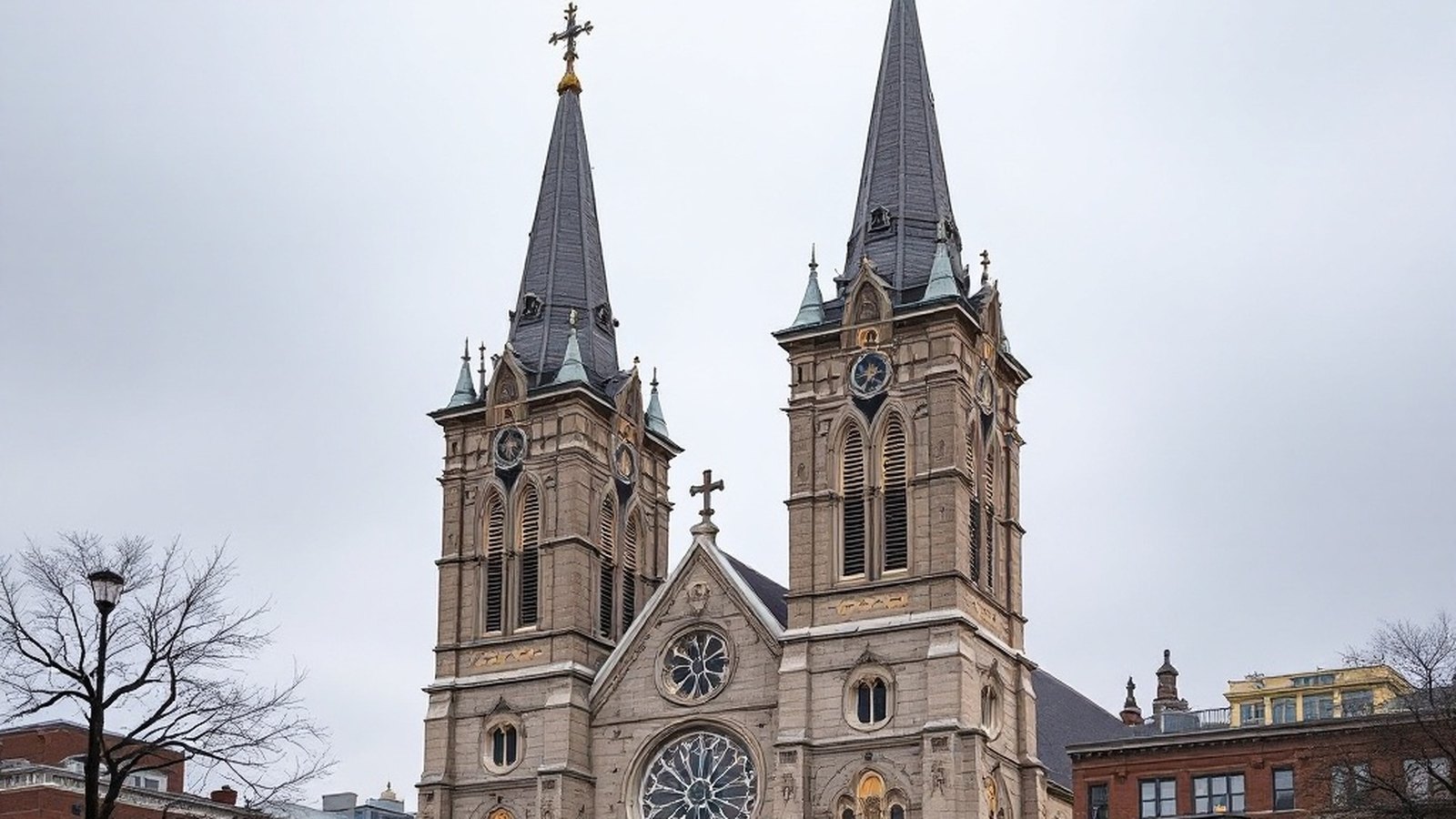 The twin puddingstone towers of the Basilica of Our Lady of Perpetual Help (Mission Church), Roxbury, from Tremont Street in morning light